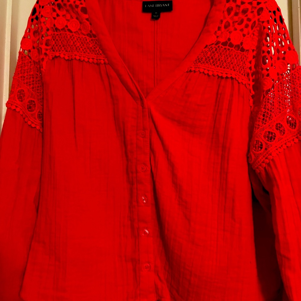 Hot pink, V neck, button up, top with lace inlay sleeves.